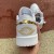 Jordan 1 Low White Metallic Gold (Women's)